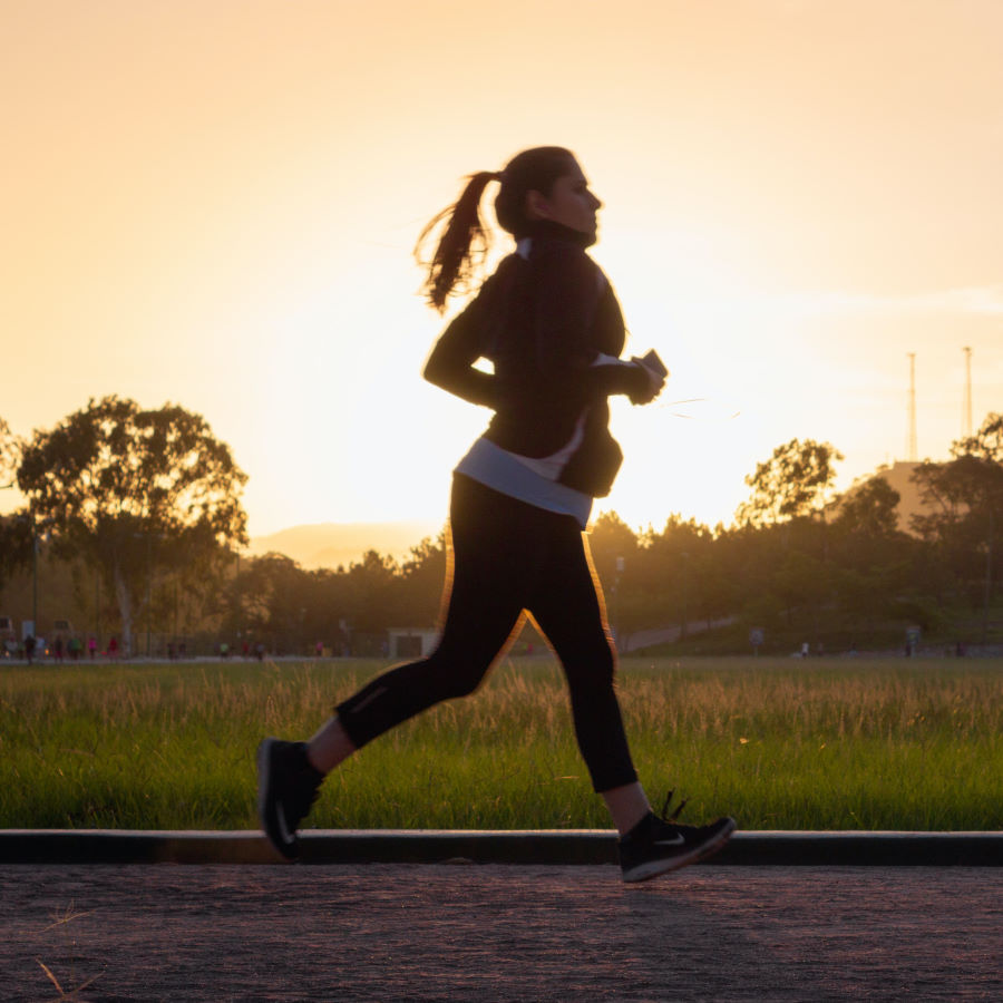 woman running at dusk